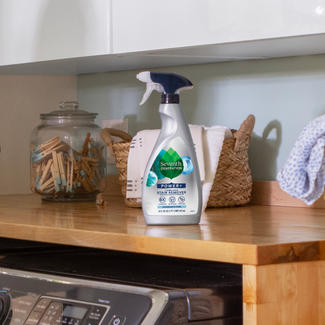 Laundry Stain Remover bottle on laundry room countertop