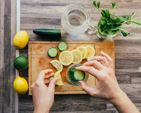 Lemon, Cucumber and mint on cutting board