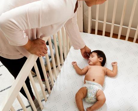 Baby sleeping in crib
