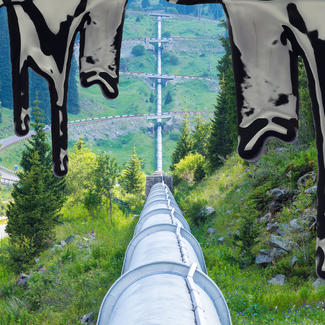 Pipeline cutting through landscape, with oil overlay